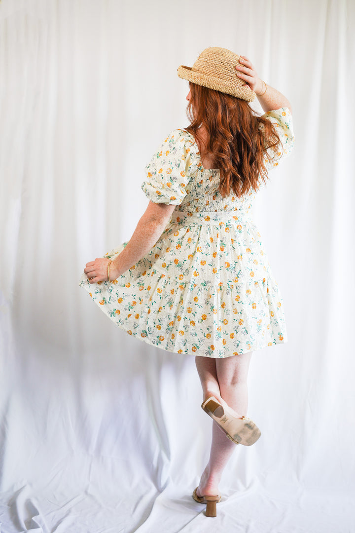 embroidered floral belted mini dress with a short puff sleeve and square neck