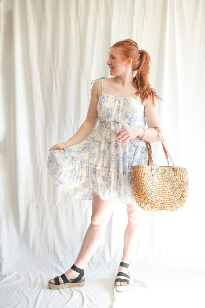 blue and white toile tiered dress With a ruffle hem and thin tie straps