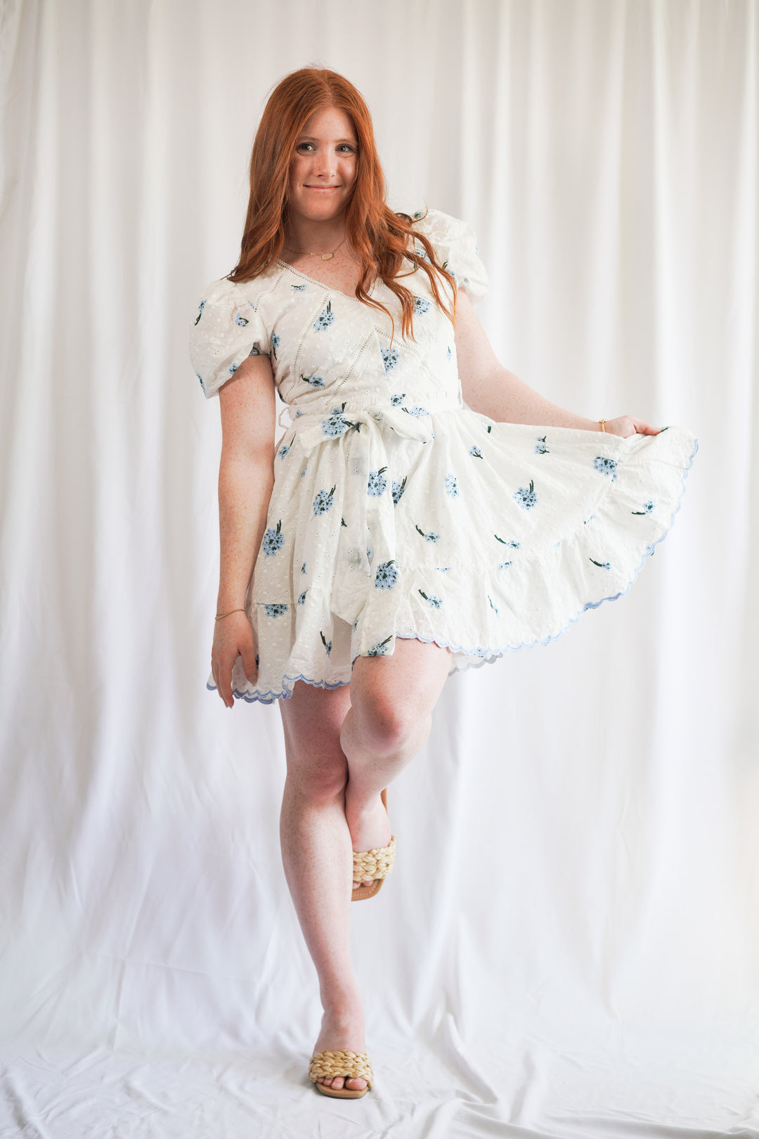 blue floral all-over eyelet detailed mini white dress with short sleeves 