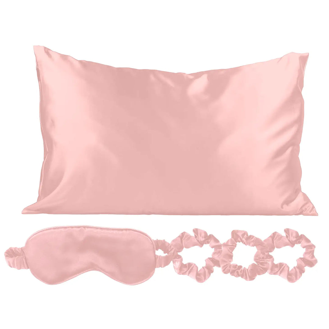 Pink satin pillow case, eye mask and scrunchies.