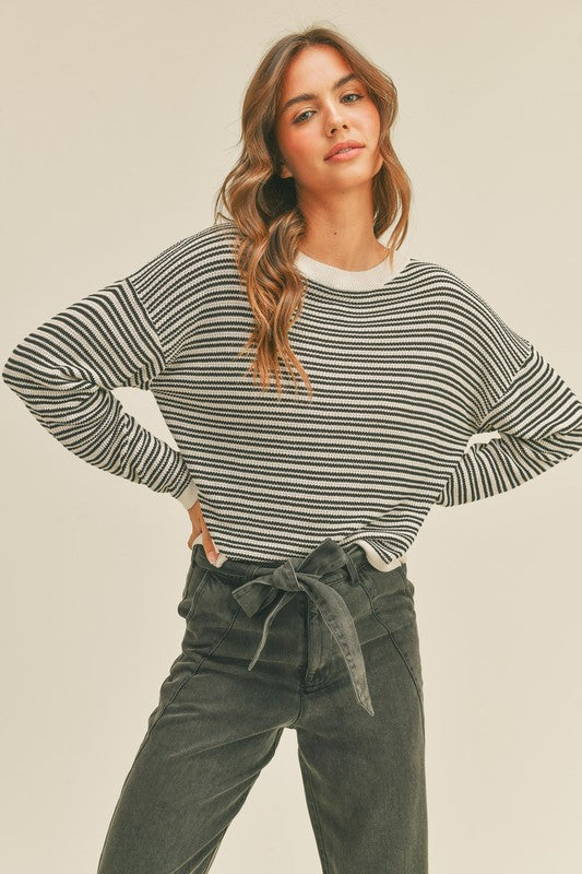 black and white knit top