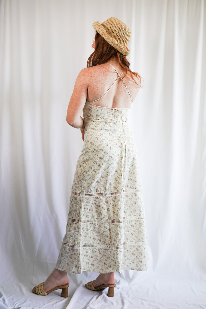 lacey floral maxi dress with a halter neck and an open crisscross back 