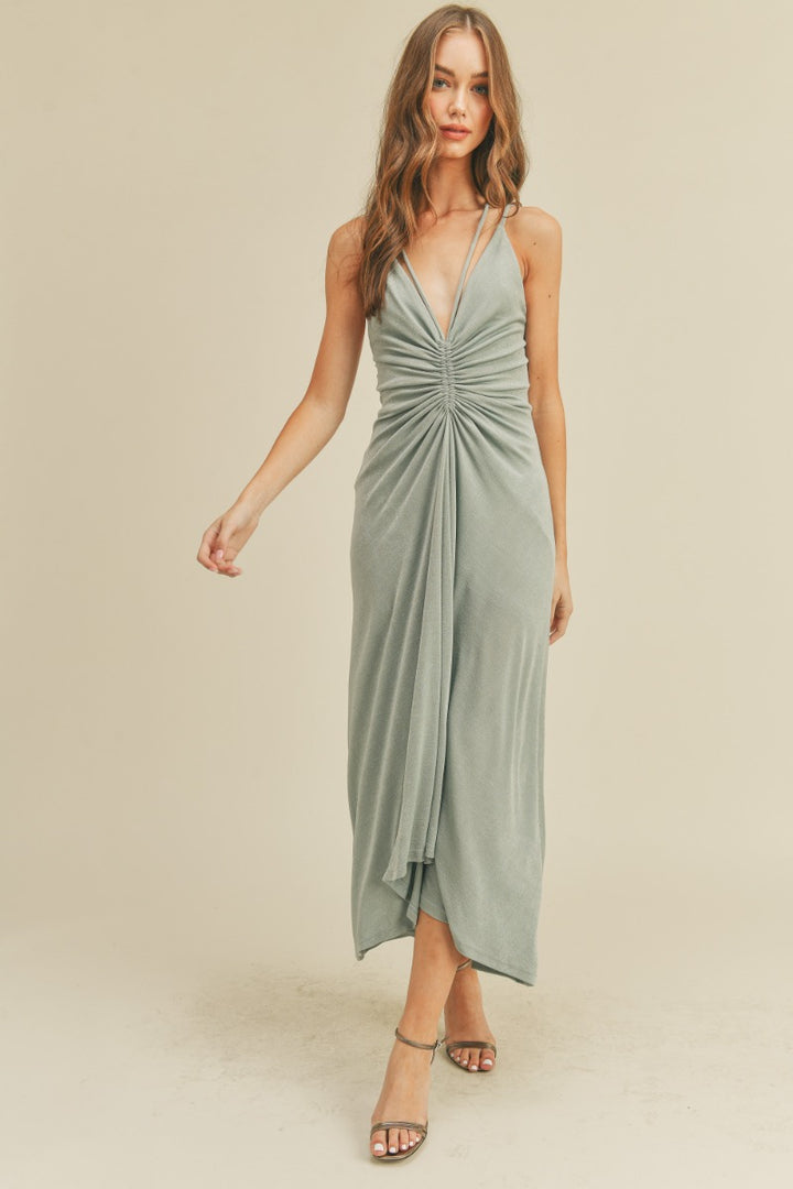Ruched minty-grey halter dress, deep v-neck detail, midi length and self tie open back detailing. 