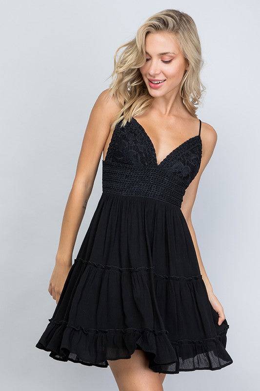 Black, lace bralette top dress, adjustable spaghetti straps and an open back that ties in a bow. 