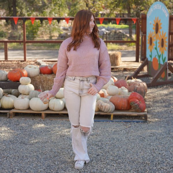 Fall outfit with a Lilac sweater turtleneck paired with light distressed jeans